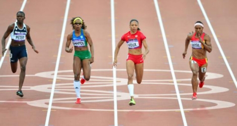 L'Américaine Allyson Felix (2d) lors des séries du 100 m aux JO de Londres, le 3 août 2012.