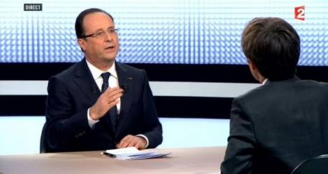 Capture d'écran du passage télévisé sur la chaîne France 2 du président français François Hollande, le 28 mars 2013 à Paris