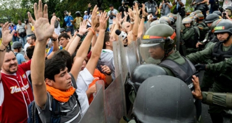Des opposants au président du Venezuela Nicolas Maduro manifestent, le 11 mai 2016 à Caracas.