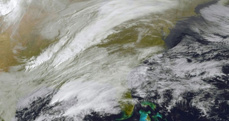 La ville de New York et les États-Unis se préparaient le 13 mars 2017 à affronter la plus grosse tempête de neige de la saison, comme le montrent ces images satellite de la NASA/NOOA 
