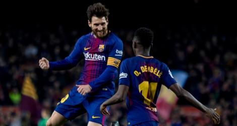 Le leader Barcelone, mis sur orbite par le duo Messi-Suarez, a surclassé Gérone 6-1 samedi.