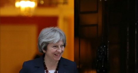 La Première ministre britannique Theresa May quitte le 10 Downing Street le 14 mars 2018