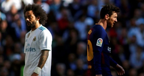 Le défenseur du Real Madrid Marcelo et l'attaquant du FC Barcelone Lionel Messi lors du clasico, le 23 décembre 2017 au stade Santiago Bernabeu 
