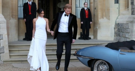 Le prince Harry et Meghan quittent le palais de Windsor après leur mariage, le 19 mai 2018.