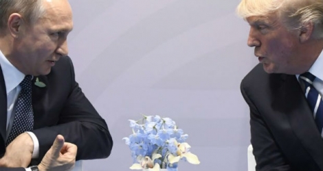 Le président russe Vladimir Poutine et son homologue américain Donald Trump au G20 de Hambourg en Allemagne, le 7 juillet 2017.