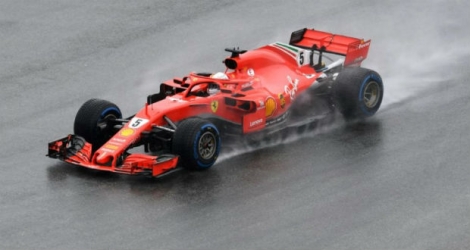 La Ferrari de l'Allemand Sebastian Vettel au cours de la 3e séance d'essais libres avant le GP d'Allemagne sur le circuit de Hockenheim.