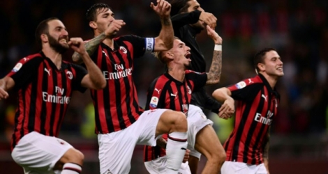 Les joueurs de l'AC Milan célèbrent la victoire face à l'AS Rome 2-1 en ouverture de la 3e journée du championnat d'Italie le 31 août 2018.
