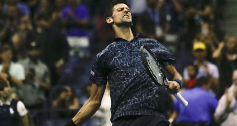 Novak Djokovic vainqueur de l'Australien John Millman en quart de finale dans la touffeur de l'US Open à Flushing Meadows, le 5 septembre 2018