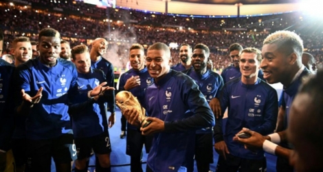 Les Bleus fêtent le titre de champions du monde devant leur public, à l'issue du match contre les Pays-Bas au Stade de France, le 9 septembre 2018.