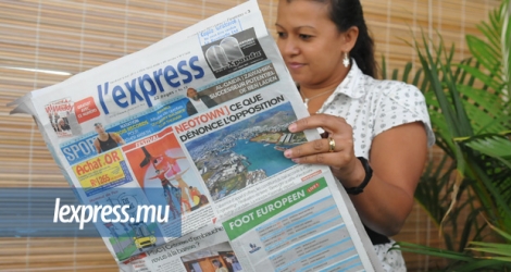 En raison de la presse sur laquelle est imprimé l'express, le format du journal ne peut être reconstitué.