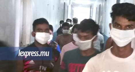 Les employés bangladais devront porter des masques jusqu’à la fin de la quarantaine.