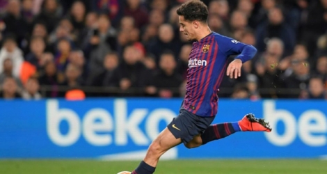Le milieu brésilien du FC Barcelone Philippe Coutinho ouvre la marque sur penalty contre Séville en quart de finale retour de la Coupe du Roi, le 30 janvier 2019 au Camp Nou à Barcelone.