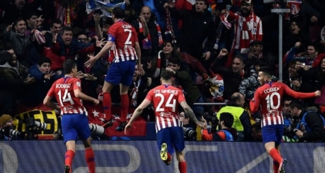 Le défenseur uruguayen de l'Atlético Diego Godin (2e en partant de la g.) vient de marquer le but du 2-0 contre la Juventus en 8e de finale aller de la Ligue des champions, le 20 février 2019 à Madrid 