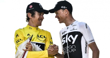 Les Britanniques Geraint Thomas (g) et Chris Froome lors de la dernière étape du Tour de France le 29 juillet 2018.