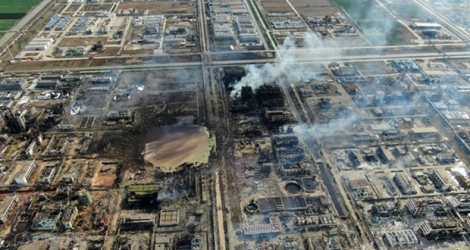Une vue aérienne montre le site d'une usine chimique après une explosion dans la ville chinoise de Yancheng à 260 km au nord de Shanghau, le 22 mars 2019. Le bilan de l'explosion est monté à 64 morts et plusieurs dizaines de blessés et de disparus.