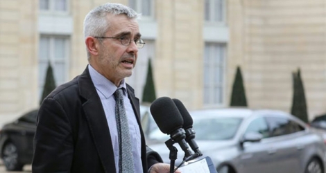 Yves Veyrier, secrétaire général du syndicat Force Ouvrière, répond aux questions des journalistes devant le Palais de l'Elysée en décembre 2018.