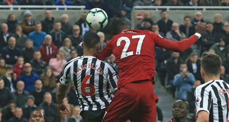 Le joueur de Liverpool Divock Origi (d) buteur lors de la victoire 3-2 à Newcastle en 37e journée de Premier League le 4 mai 2019.