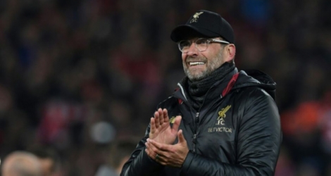  L'entraîneur de Liverpool Jürgen Klopp applaudit ses joueurs après la victoire face au Barça en demi-finale retrour de C1 à Anfield, le 7 mai 2019.