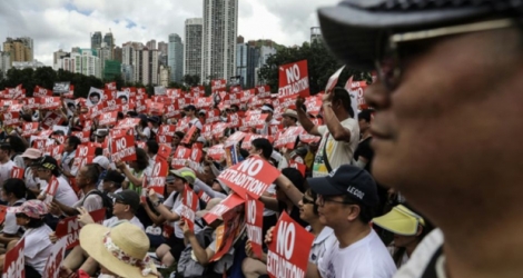 Des manifestants à Hong Kong protestant contre un projet de loi d'extradition vers la Chine, le 9 juin 2019.