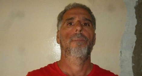 Photographie fournie par le ministère uruguayen de l'Intérieur le 24 juin 2019, montrant l'Italien Rocco Morabito, recherché depuis plus de 20 ans pour trafic de drogue et activités mafieuses au cours de son arrestation en Uruguay.