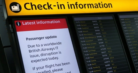 Un tableau d'affichage de l'aéroport de Londres Heathrow le 29 mai 2017, lors d'un précédent problème informatique ayant perturbé les vols de British Airways.
