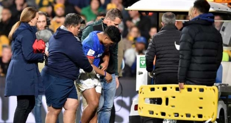 Le demi de mêlée des Samoa, Scott Malolua, blessé lors du match de préparation au Mondial face à l'Australie, à Sydney, le 7 septembre 2019 Photo Peter PARKS. AFP