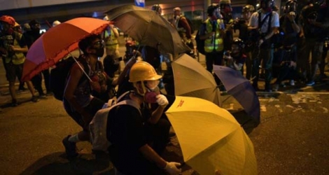 Manifestants près des bureaux du gouvernement central dans le quartier d'Admiralty à Hong Kong, le 28 septembre 2019, pour le cinquième anniversaire du «Mouvement des Parapluies».