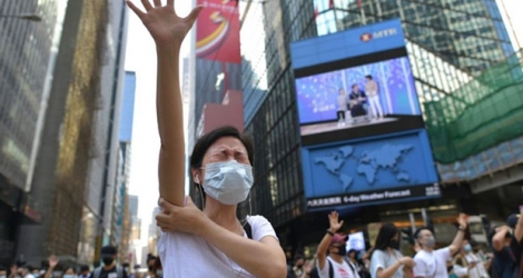 Rassemblement contre une loi d'urgence interdisant le port du masque lors de manifestations, le 4 octobre 2019 à Hong Kong.