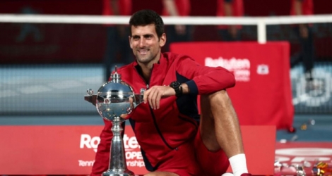Le Serbe Novak Djokovic célèbre sa victoire au tournoi du Japon, à Tokyo, le 6 octobre 2019.