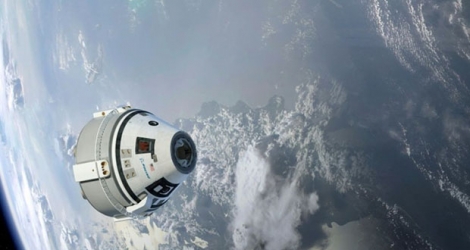Illustration de la capsule Starliner en orbite autour de la Terre, fournie par Boeing en 2015.