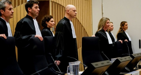 La Cour, au tribunal de Schiphol, lors de l'ouverture du procès de trois Russes et un Ukrainien accusés d'avoir provoqué l'explosion de l'appareil au-dessus de l'Ukraine en 2014, le 9 mars 2020.