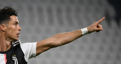 La star de la Juventus Cristiano Ronaldo après son but contre la Lazio Rome le 20 juillet 2020 à Turin Photo Marco BERTORELLO. AFP