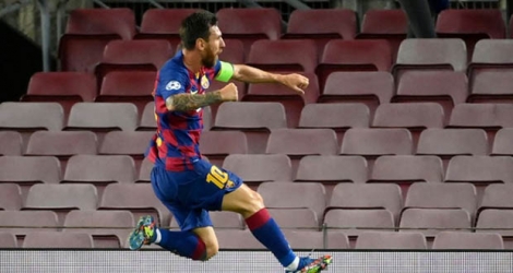 Lionel Messi exulte après son but contre Naples, en 8e retour de la Ligue des champions, le 8 août 2020 au Camp Nou.