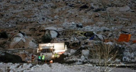 Les secours sur le site à Ask, le 2 janvier 2020 après le glissement de terrain qui a fait d'ores et déjà 5 morts Photo Jil Yngland. AFP