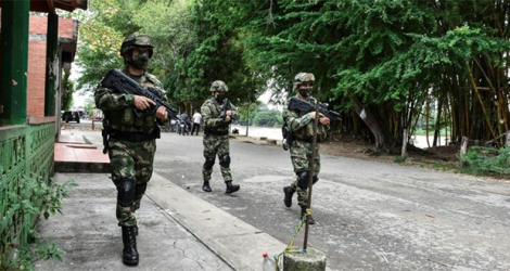 Des soldats en patrouille à Arauca, le 25 mars 2021 en Colombie. afp.com - Daniel Fernándo MARTINEZ CERVERA
