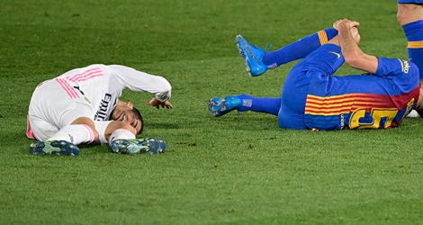 Lucas Vazquez se blesse lors de Real-Barça. © JAVIER SORIANO - AFP