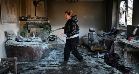 Une maison touchée par un bombardement dans le district d'Osokorky dans le sud-est de Kiev en Ukraine, le 15 mars 2022.