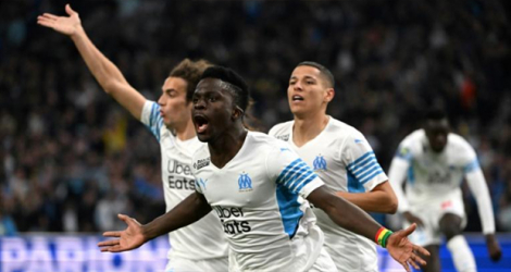 La joie de l'attaquant sénégalais de Marseille Bamba Dieng, après avoir ouvert le score contre Montpellier, en clôture de la 31e journée de Ligue 1, le 10 avril 2022 au Stade Vélodrome.