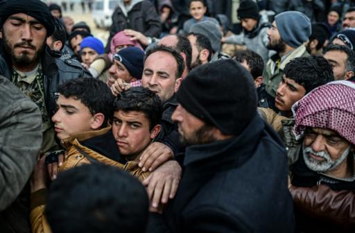 Migrants: la Turquie prête à ouvrir sa frontière aux Syriens fuyant Alep