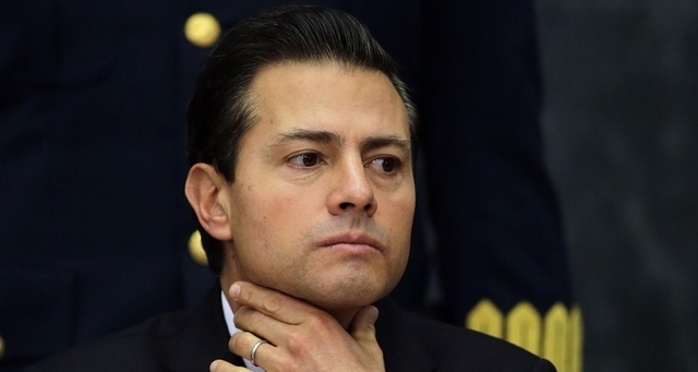 Mexique: le président Peña Nieto condamne le projet de mur de Donald Trump