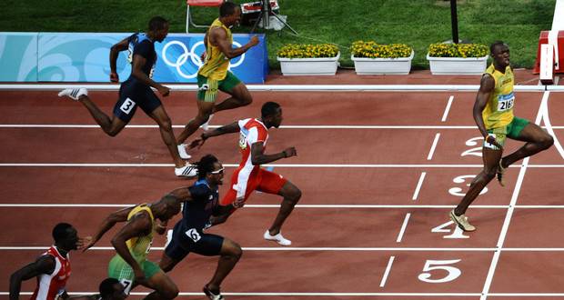 Taquin, Usain Bolt défend la "distanciation" avec une photo de son 100 mètres